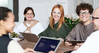 Group of People Working At a Table