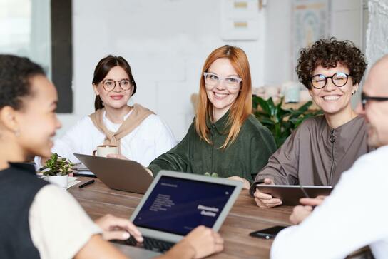 Group of People Working At a Table